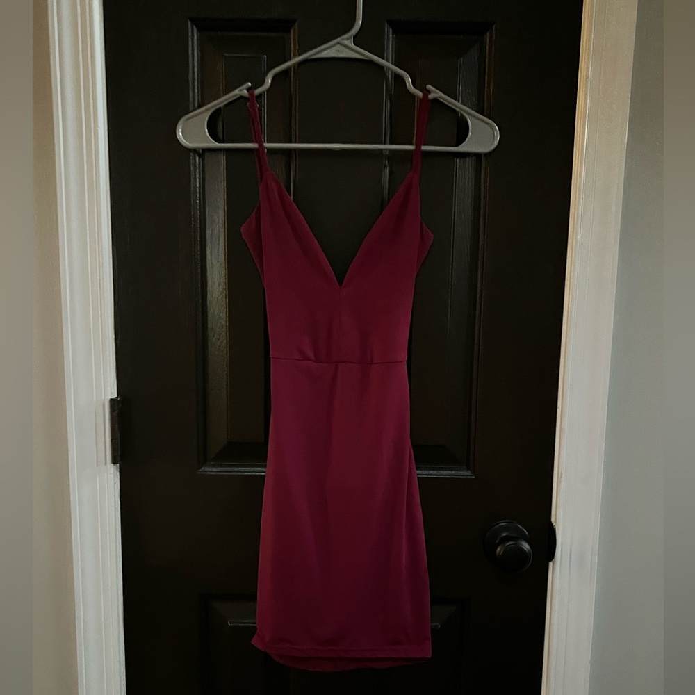 Mini dress, with an open back.